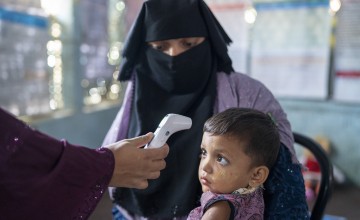 Moriyom* (25) a Rohingya mother is visiting Concern nutrition centre with her child Alima* (3) to receive ready-to-use therapeutic food (RUTF) and regular health examination such as MUAC, height and weight measuring in the nutrition centre at Camp 13, Rohingya camp, Ukhiya, Cox's bazar. Photo: Saikat Mojumder/Concern Worldwide