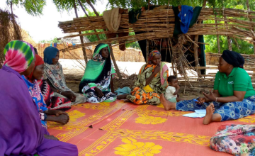 Concern staff member with a women's focus group of Addemour village. Photo: Prudence Ndolimana/Concern Worldwide