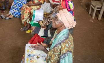 Programme participants meet for an income-generating training session. Photo: Samuel Isenge/Concern Worldwide