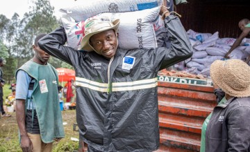 Concern Emergency Response Programme Manager, carries and distributes food. Photo: Samuel Isenge/Concern Worldwide