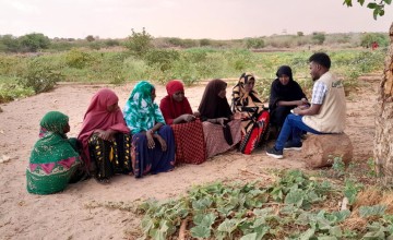 Concern team with a women's permagarden group discussing the impact of Hanaano project and expected results. Photo: Abdinasir Hassan/ Lifeline Gedo.