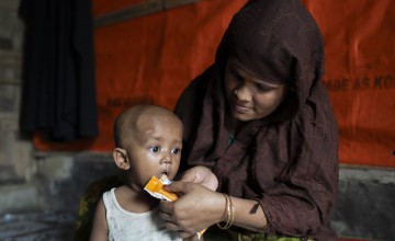 Mother feeding her child