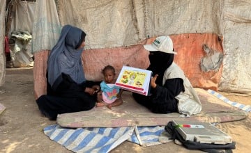 Basma, the CHV, conducts nutrition counselling with Fatima’s* mother. Photo: Concern Worldwide.