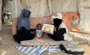 Basma, the CHV, conducts nutrition counselling with Fatima’s* mother. Photo: Concern Worldwide.