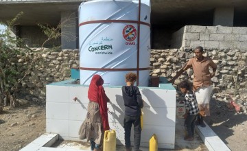 Water network and water storage tanks connected to solar-powered water system constructed by Concern’s local partner, GWQ, in Ta’iz governorate. Photo: GWQ.