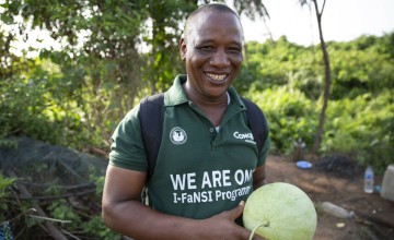 Mohamed, IFaNSI Concern Field Assistant on a farm near Buchanan. Photo: Kieran McConville/Concern Worldwide.