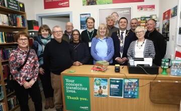 Group of volunteers in a charity bookshop