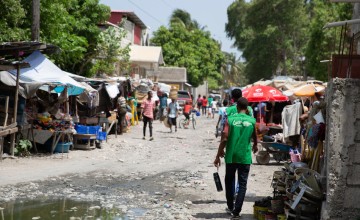 Concern team members on the streets of Cité Soleil in Port-au-Prince, Haiti. Photo: Kieran McConville/Concern Worldwide.