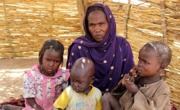 Woman in Chad with three young children