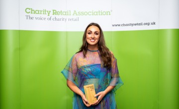 A woman receives an award