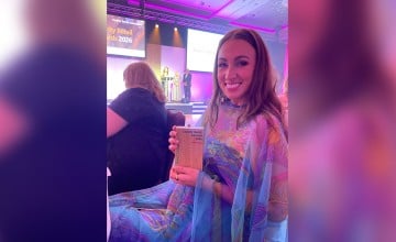 Fiona with her award for charity retail leader of 2026.