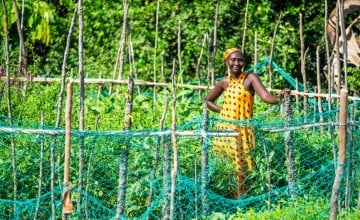Agnes is a farmer, wife and mother. Through the FFS, she has diversified her farming to include rice, groundnuts, and cassava. Photo: Eugene Ikua/Concern Worldwide.