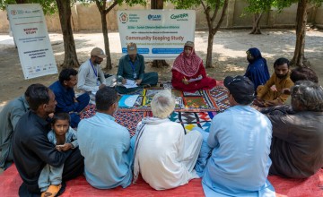 Community members in Shaheed Benazirabad work together to map their village during a ZCRA scoping study. Photo: Arif ShadConcern Worldwide.