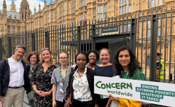 Members of Concern Worldwide stand outside of Parliament