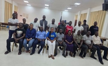 County stakeholders reviewing hazard maps during the Tana River Hazard Atlas workshop June 2026. Photo Concern Worldwide.