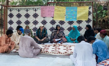 Community members in Shaheed Benazirabad meet with ZCRA staff. Photo: Arif Shad/Concern Worldwide to discuss local challenges linked to climate change.