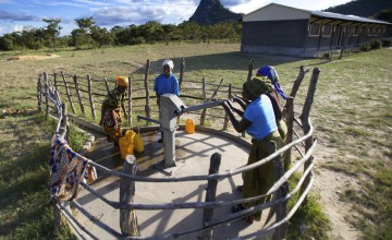 Members of the School Governing Council demonstrating clean water access at Chimbadzuo Primary School, Manica District, Mozambique. Photo: Kieron Crawley / Concern Worldwide.