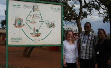Jenny Swatton Claver Kubuhungu and Felicite Ndikiyuro at the CRM sign. Photographer: Rosaleen Martin