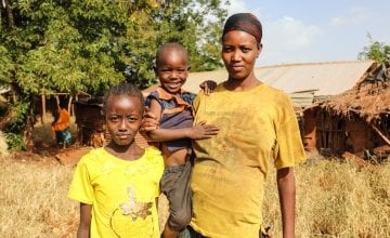 Nasino Asuran (20) is six months pregnant with her third child. Pictured here with her daughter Nangiro and son Sampson, the family are malnourished and have not eaten all day, they normally eats boiled maize once a day. Leyai Village, Marsabit, Kenya.