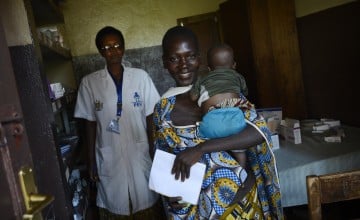 Relieved, Aline leaves the clinic with the amoxicillin medication she needs to treat Roger at home. Photo: Chris de Bode/Panos Pictures for Concern Worldwide