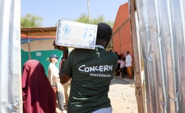 Concern Worldwide staff unloading trucks ahead of food distribution in Filtu, Somali Region, Ethiopia. Photo: Jennifer Nolan/ Concern Worldwide
