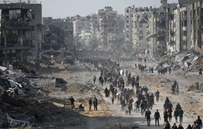 Displaced Palestinians start to return to their houses in Gaza City, Gaza. 