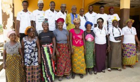 Community members and medical staff outside a health centre in Sierra Leone. A management committee was established with support from Concern, to ensure the security and smooth running of the facility Photo: Kieran McConville/Concern Worldwide.