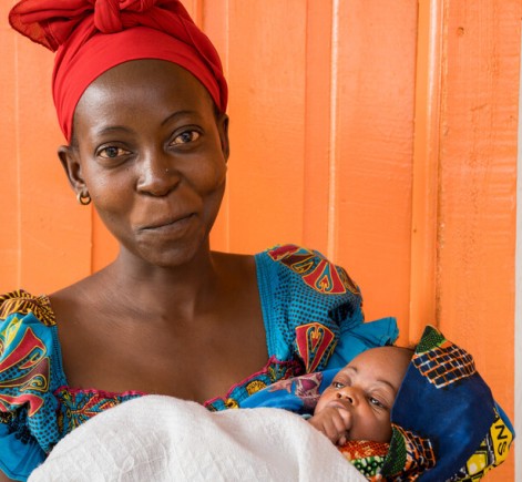 Esperance with her three week old daughter