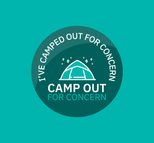 A badge with a tent and stars that reads “I’ve Camped Out for Concern”.