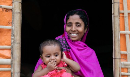 *Noor Fatima with baby daughter *Laila (9 months). Noor and her family fled violence in Myanmar and are now living in a camp in Bangladesh. They have received emergency assistance from Concern, funded by the Disasters Emergency Committee. Bangladesh. Photo: Paddy Dowling/DEC/ Concern Worldwide