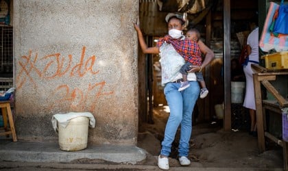 Baby Charlyne and Margret in the alleyway outside there home in Kibera. Nairobi. Photo: Ed Ram / Concern Worldwide