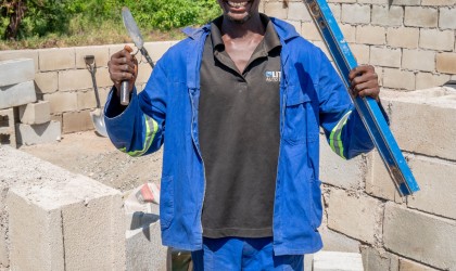 Jusa James was able to buy carpentry equipment, barber equipment and building equipment to do business in all three sectors, with money he and his wife received from Concern. Photo: Chris Gagnon