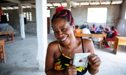 Nadige, a member of a VSLA (village savings and loan) association in her neighborhood in Cité Soleil, Port-au-Prince, Haiti. Photo: Kieran McConville/Concern Worldwide