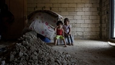 Syrian refugees *Alya, aged 5, and her cousin *Sultan, aged 4, are pictured in the home they share with their family and cousins after being moved by Concern as they were in danger. Photo: Mary Turner