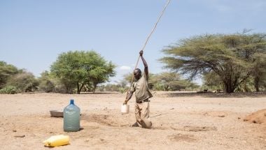 Joseph Ikitela fetches water from a hand-dug well that his community is currently relying on in Northern Kenya’s Moruongor village in Turkana County. Photo: Lisa Murray/Concern Worldwide
