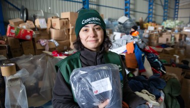 Ozge Celebi of Concern Worldwide Türkiye says the team organising distribution of donated goods have been finding messages of goodwill for the recipients of Adiyaman city centre who were badly hit by the earthquake of February 6th, 2023. As many as half of the buildings were destroyed or rendered uninhabitable. (Photo: Kieran McConville/Concern Worldwide)