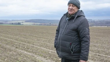 A photo of Ivan Ivan Zakharenko standing in a field.