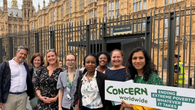 Members of Concern Worldwide stand outside of Parliament