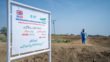 A UK Aid logo and a Concern Worldwide logo on a sign in Pakistan