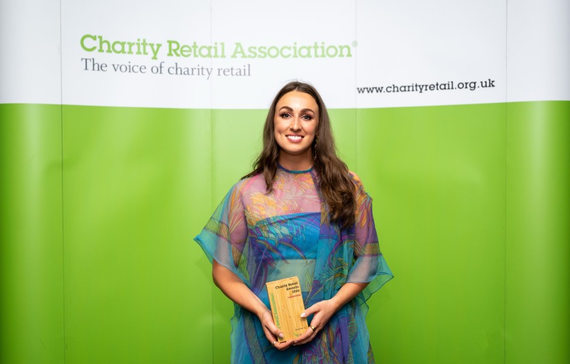 A woman receives an award