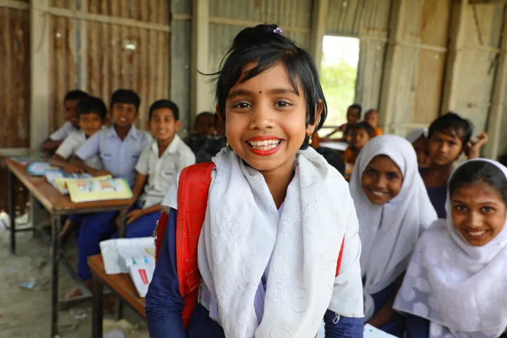 Saliha* (7) attends school at the newly repaired school on one of the Char islands severely affected by recent floods. The floods caused considerable damage to the school structure itself, as well as to books, furniture and other supplies. Concern supports Saliha's family through multi-purpose cash grants to pay for tuition fees and school supplies. Photo: Jennifer Nolan / Concern Worldwide Saliha* (7) attends school at the newly repaired school on one of the Char islands severely affected by recent floods. The floods caused considerable damage to the school structure itself, as well as to books, furniture and other supplies. Concern supports Saliha's family through multi-purpose cash grants to pay for tuition fees and school supplies. Photo: Jennifer Nolan / Concern Worldwide