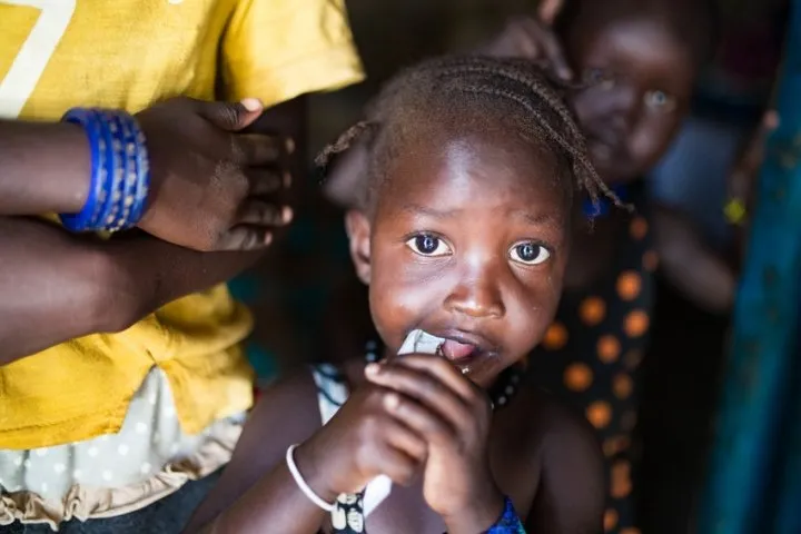 This young child from South Sudan can avoid malnutrition thanks to life-saving sachets of peanut paste. Photo: Steve De Neef / Concern Worldwide This young child from South Sudan can avoid malnutrition thanks to life-saving sachets of peanut paste. Photo: Steve De Neef / Concern Worldwide