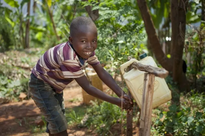 Kevin, six, is a handwashing pro thanks to the tap in his Burundi village! Photo: Abbie Trayler-Smith / Concern Worldwide