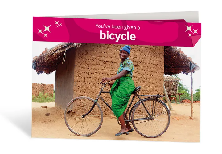 Jennifer gets ready to set off on her bike in Malawi. Photo: Jason Kennedy / Concern Worldwide