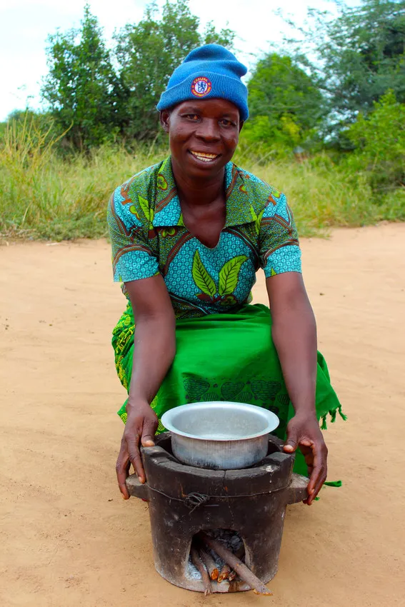 Jennifer is so happy she can now cook for her five children more efficiently and hygienically. Photo: Jason Kennedy / Concern Worldwide