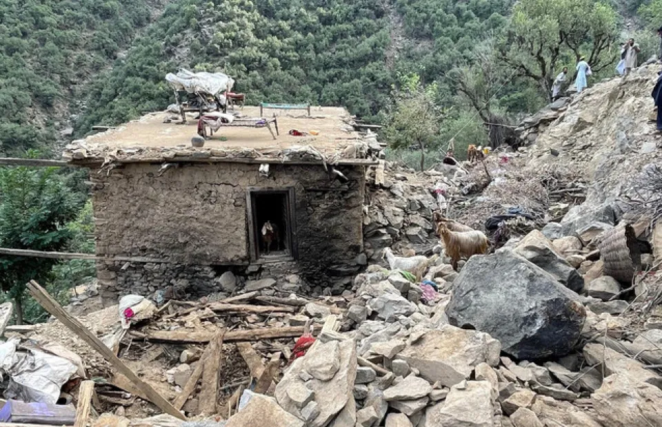A building surrounded by rubble in Afghanistan.