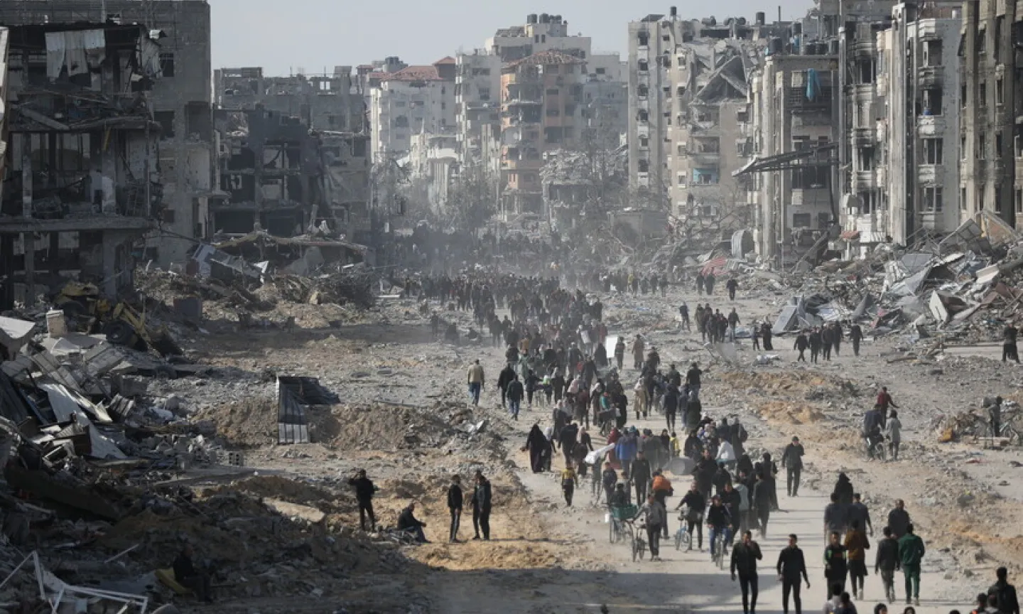 Displaced Palestinians start to return to their houses in Gaza City, Gaza. 