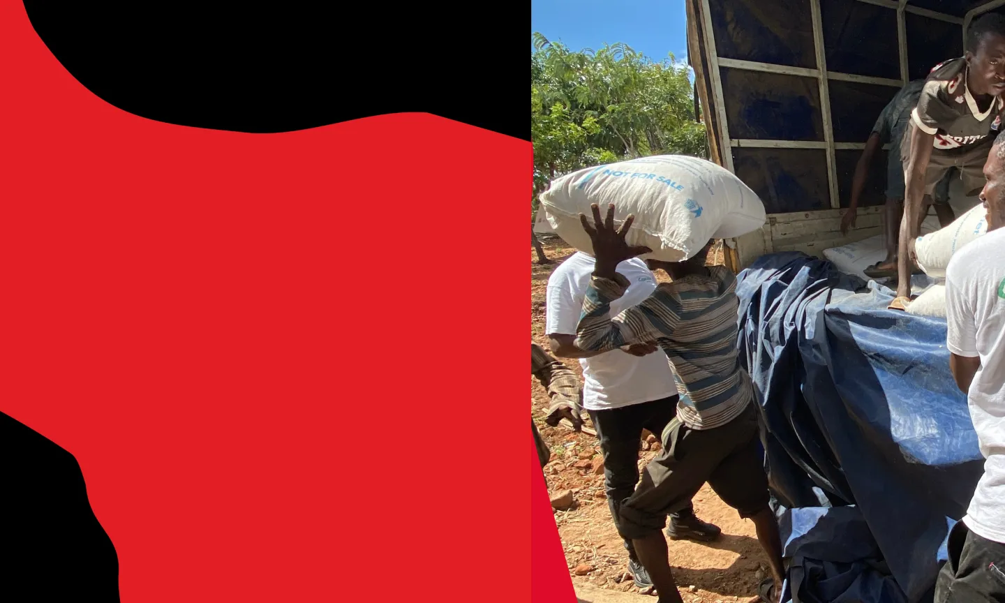Concern Worldwide staff unload emergency aid from truck