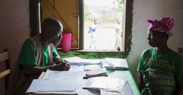Health nutrition officer Serge Magloire (45) records the health details of Fanambi’s four-year-old son Mathurin, who is severely malnourished. Photo: Chris de Bode / CAR