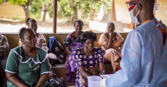 Infection prevention and control (lPC) training for staff at Lumpa Health Center, being conducted by staff from Concern Worldwide during Ebola outbreak in Sierra Leone.